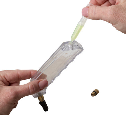 Dropper putting oil in glass cutter